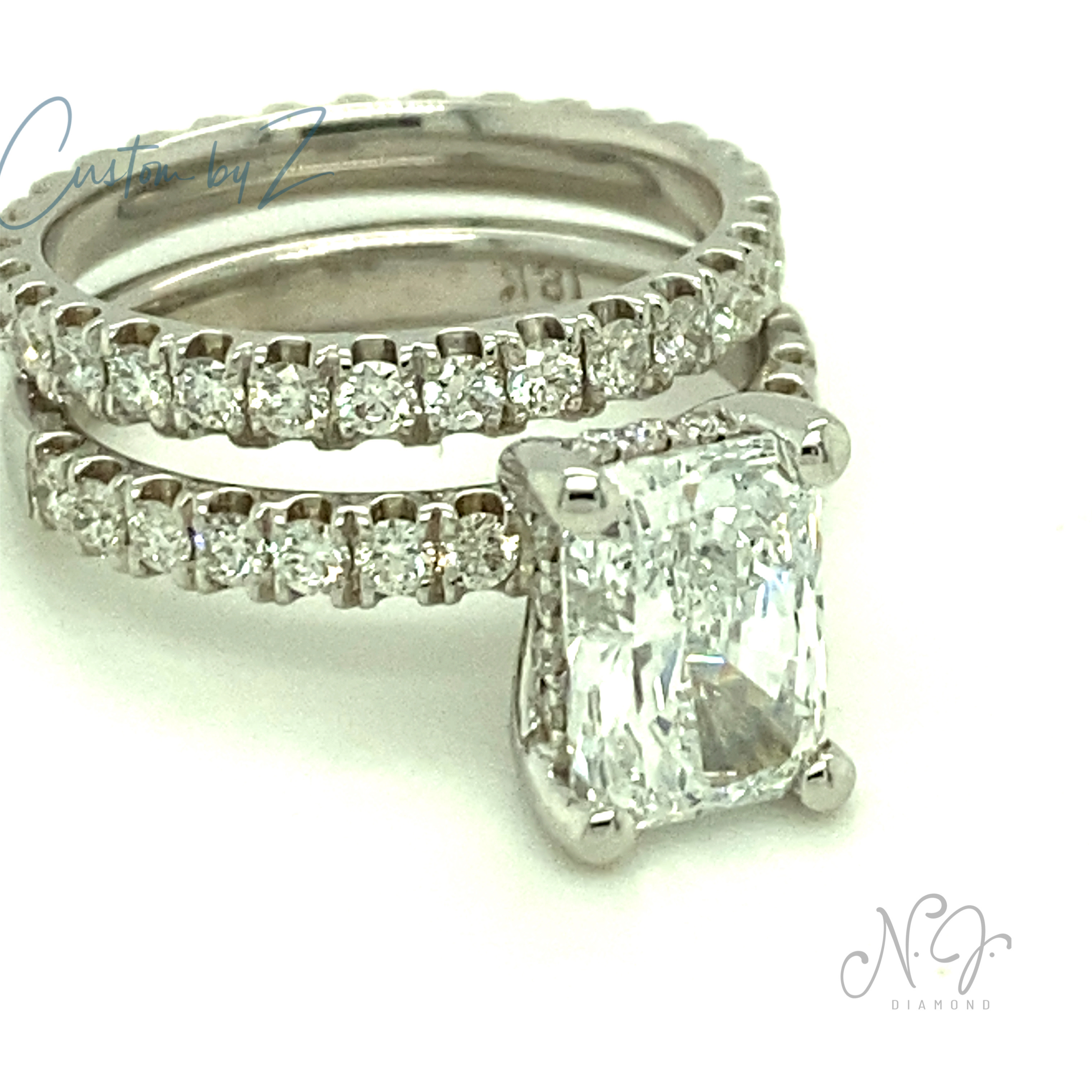 Emerald Cut Diamond Center Stone Diamond Engagement Ring.